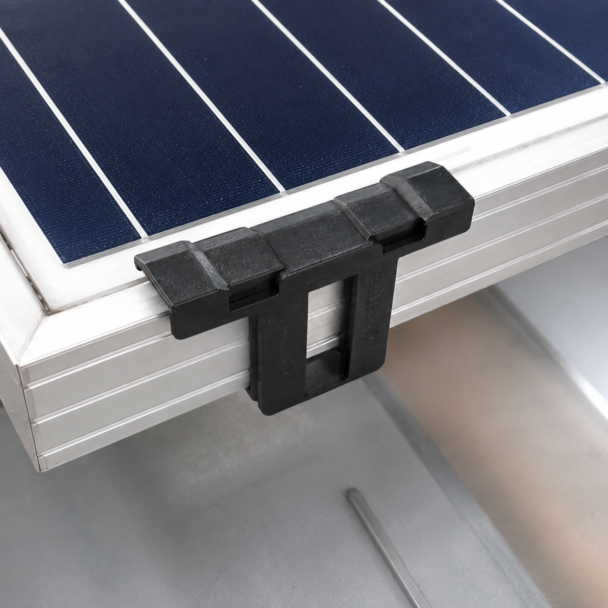 Water drain clamp installed on solar panel